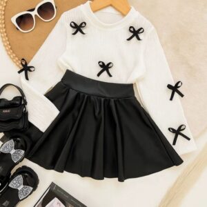 CONJUNTO MANGAS LARGAS MOÑOS Y POLLERA CUERINA 8 AÑOS
