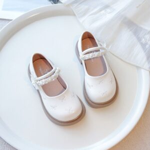 ZAPATITO BEIGE DETALLE MOÑITOS Y MARIPOSITA