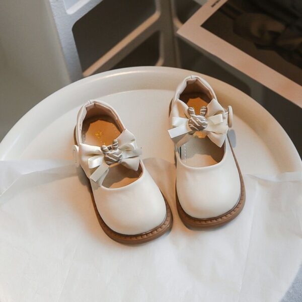 ZAPATITO BEIGE DETALLE CONEJITO Y MOÑO