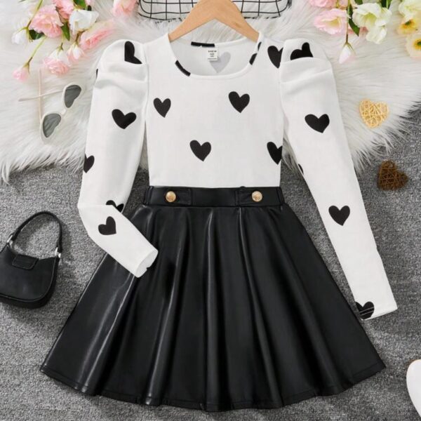 CONJUNTO MANGAS LARGAS CORAZONES Y POLLERA DE CUERINA T 7 AÑOS