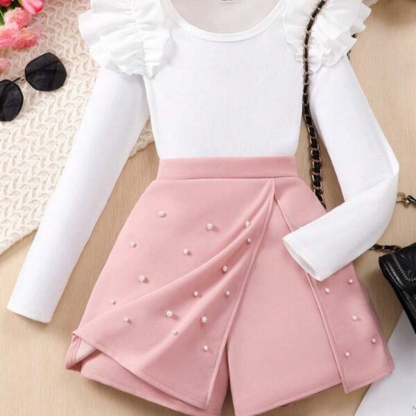 CONJUNTO MANGAS LARGAS BLANCO CON SHORT POLLERA ROSA CON PERLITAS T 10 AÑOS
