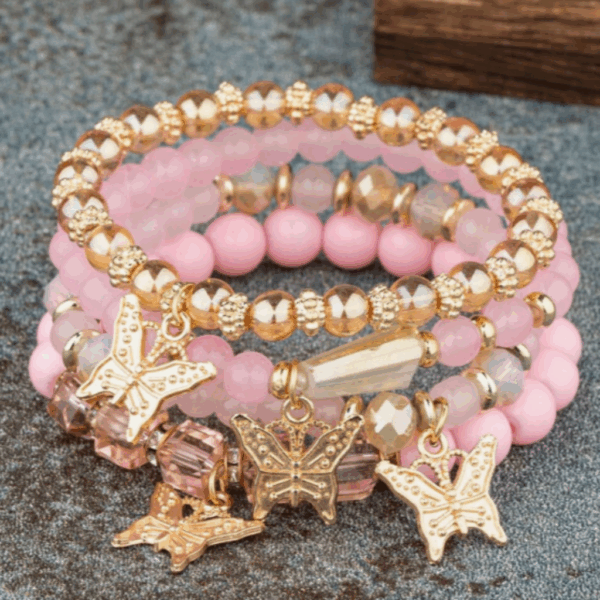 JUEGO DE 4 PULSERAS CON COLGANTES MARIPOSAS - Imagen 2