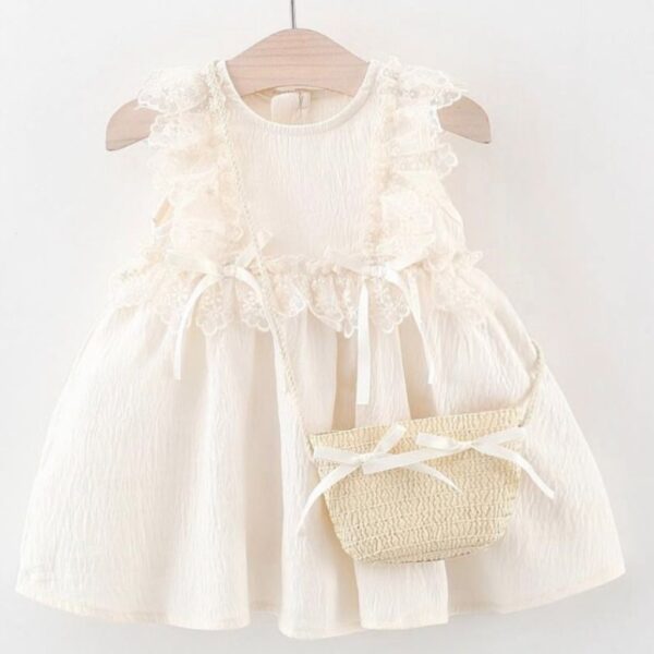VESTIDO CRUDO CON CARTERITA T 6-9 MESES