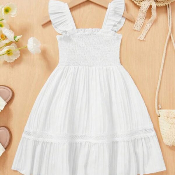 VESTIDO BLANCO CON DETALLE FALDA 6 AÑOS