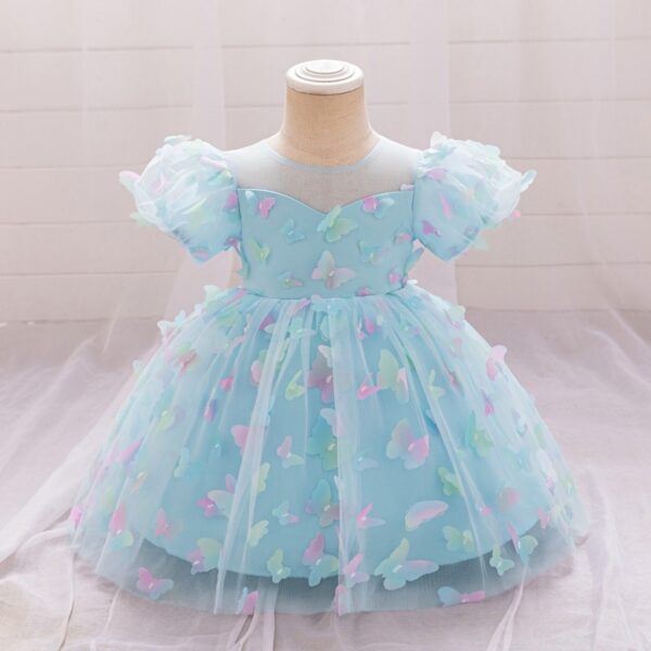 VESTIDO DE FIESTA CELESTE CON MARIPOSAS DE COLORES T 9-12