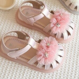 SANDALIA ROSA CON FLOR POMPOM