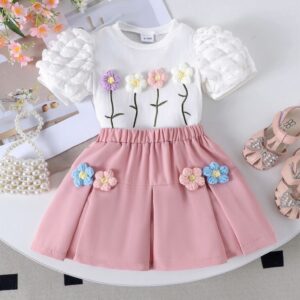 CONJUNTO REMERA Y POLLERA ROSA T 9-12 MESES