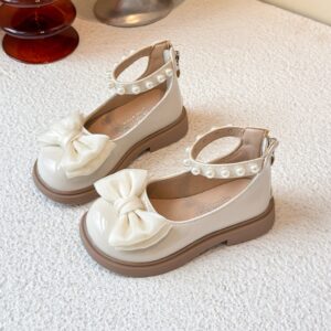 ZAPATITO BEIGE DETALLES PERLITAS Y MOÑO