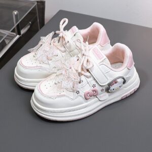 CALZADO KITTY ROSA Y BLANCO DETALLES LAZO