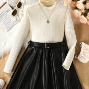 CONJUNTO MANGAS LARGAS Y POLLERA CUERINA CON CINTO T 8 AÑOS
